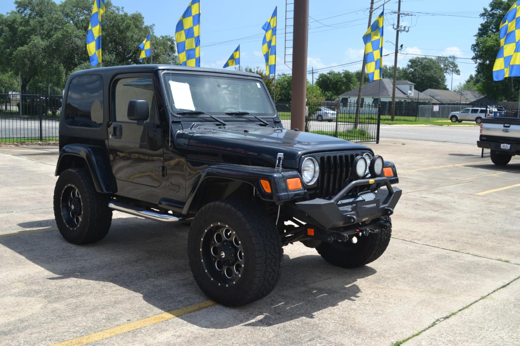 2003 BLACK /BLACK Jeep Wrangler X (1J4FA39S13P) with an 4.0L L6 OHV 12V engine, 4-Speed Automatic | 5-Speed Manual transmission, located at 1355 North 11th Street, Beaumont, 77702, (409) 832-0006, 30.094290, -94.130096 - Photo #6